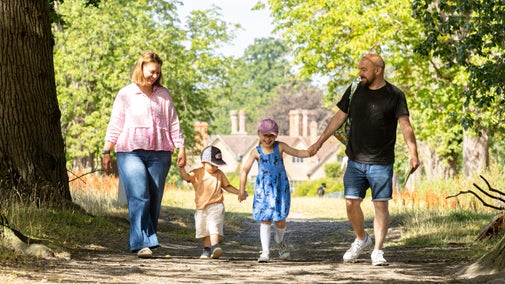 A family exploring the estate at Packwood House, Warwickshire